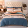 Nuevo juego de ropa de cama de cuatro piezas de algodón grueso cepillado, funda de edredón, sábana de algodón, funda de edredón, juego de tres piezas, venta al por mayor