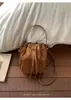 Bolso de Nicho para Mujer 2026 Nuevo Invierno Vintage Borla Versátil Bolso de Hombro para Viajes Diarios Cruzado Bolso Cubo de Moda
