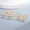 Aretes pequeños de flor de perla con tachuelas de diamantes para mujer, diseño de nicho, versátiles para el día a día, mini dulces y delicados de alta gama, nuevos