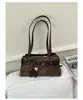 Bolso de axila texturizado transfronterizo para mujer, nuevo modelo 2026, bolso baguette de nicho de lujo ligero, bolso de trabajo, bolso tote vintage esmerilado