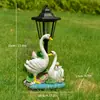 Adornos de pato blanco artificial transfronterizos, decoraciones para paisajismo de jardines exteriores, luces creativas alimentadas por energía solar para villas y jardines
