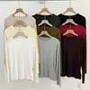 Estilo coreano! Camiseta minimalista e elegante de gola redonda e mangas compridas para o Outono/Inverno de 2026, fica bem usada sozinha ou em camadas, versátil