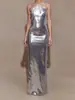 Moda Feminina de Inverno Novidades: Vestido Longo de Sereia Elegante Prata Brilhante Sexy Decotado nas Costas com Gola Halter Estilo Europeu e Americano
