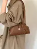 Bolso de mano de alta gama, versátil para mujer, nueva moda 2026, bolso de hombro exquisito, estilo coreano, bolso tipo bowling de nicho