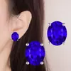 Pendientes de botón de moda versátiles y modernos con diamante de color de cuatro garras en forma de huevo Pendientes de botón versátiles para uso diario con garra ovalada Modernos