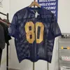 Novo Estilo Europeu e Americano Design Vazado 80 Estrelas Digitais Blusa de Tricô Solta Gola Redonda Manga Curta Esportiva Tendência Masculino e Feminino