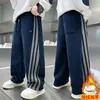 Ropa Infantil Niños Pantalones Deportivos Rectos con Raya Lateral Primavera y Otoño 2026 Niños Grandes Pantalones de Punto Holgados Primavera Venta al por Mayor Transfronteriza
