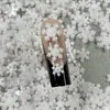 Decorações de Artes para Unhas de Floco de Neve de Natal com Glitter Branco Transfronteiriças de Inverno Acessórios de Resina Capa de Celular DIY Acessórios de Cabelo 3D