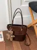 Nuevos Dijes para Bolsos Mini Simples Sensación de Alta Gama Bolsos de Tote Perezosos para Vacaciones para Mujeres Otoño Invierno Bolsos de Mano Retro