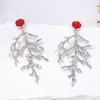 Pendientes de Aleación Oceánica con Forma de Coral Elegantes de Moda Transfronterizos Lujo Accesible Pendientes Populares de Gama Alta para Mujer