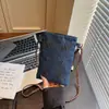 Bolso Cruzado para Teléfono Móvil Estilo Chino Transfronterizo para Mujer 2026 Nuevo Bolso de Hombro de Nicho de Mezclilla Retro Bolso Cruzado de Moda Versátil