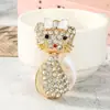 Llavero colgante de gato con lazo lindo, moderno y creativo, con diseño único, regalo artesanal para llavero de coche