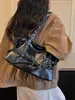 Colección de otoño 2026 transfronteriza: bolso de mano de diseño único, gran capacidad, moderno y casual, con una textura única y un diseño elegante, bolso de hombro para mujer