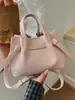 Bolso tipo cubo de color caramelo con estampado de lichi coreano para mujer, nuevo bolso tote versátil de verano 2026, bolso de hombro y cruzado para ir al trabajo
