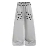 Pantalones casuales de retazos de bloques de color con estampado de estrellas retro americano para mujer, otoño, holgados, de pierna ancha, versátiles, rectos, tipo sudadera, modernos