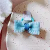 Anillo para el pulgar con lazo para bebé, fabricantes de origen, cuerda para la cabeza mini de color caramelo para bebé, lazo de color caramelo