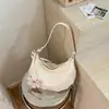 Bolso minimalista estilo coreano de moda nicho tipo empanada para mujer, nuevo modelo 2026, bolso de hombro y bandolera versátil casual de alta gama