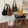 Bolso de mano de moda retro para mujer, estilo coreano, adecuado para el trabajo y los desplazamientos, bolso de axila, bolso de hombro de color liso de moda otoño 2026, venta al por mayor