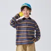 Nova Camiseta de Manga Longa Listrada Colorida Tecida 100% Algodão Haima Outono 2026 Estilo Coreano Moda Top Infantil Tendência