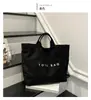 Bolso tote grande de estilo explosivo transfronterizo para mujer, moderno, versátil, para ir al trabajo, ir de compras, bolsa de tela, bolso de hombro