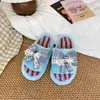 2026 nuevas pantuflas de invierno para niñas lindo lazo a rayas nuevo interior cálido punta cerrada pantuflas de bebé