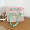 Bolso de mano de malla color-blocking estilo Ins, bolsa organizadora de rejilla color-blocking color macarrón, bolsa de mano cosmética portátil para salidas