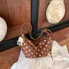 Bolso tipo cartera de diseño retro de nicho transfronterizo 2026 nuevo bolso de moda de lunares cruzado bolso de hombro para el trabajo
