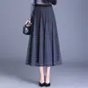 Falda plisada de malla a cuadros para mujer, nuevo estilo otoño/invierno 2026, que cubre la cadera, de longitud media, corte ajustado, línea A, falda con dobladillo ancho