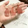Colgante de flor de durazno de Xinjiang, colgante de Buda, candado de nube auspiciosa de flor de durazno, hebilla de paz de flor de durazno, colgante de jade de zorro de hoja