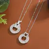 Nuevos Productos Europeos y Americanos 2025 Aliexpress Moda Lujo Ligero Elegante Collar Redondo con Colgante de Corazón Completamente Incrustado de Diamantes Zirconia para Mujer