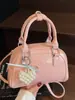 2025 Novo Estilo Casual Fresco Estilo Ouruo Bolsa Boston Portátil Nicho Versátil Comutador Bolsa Mensageiro High-end