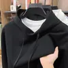 Sudadera con capucha 65% algodón anti-pilling para hombre, nuevo modelo otoño 2026, manga larga, color liso, sudadera versátil y cómoda para hombre