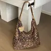 Bolsa estampada de leopardo da moda para mulheres 2026 novo modelo bolsa de ombro grande capacidade versátil bolsa de mão para o dia a dia bolsa tote bolsa de ombro