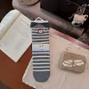 Calcetines grises para mujer, calcetines holgados para primavera y otoño, lindo perrito de dibujos animados estilo japonés, versión coreana, calcetines de media pantorrilla de moda para estudiantes, estilo Ins