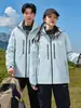 Conjunto de dos piezas sellado térmicamente con LOGOTIPO personalizado original tres en uno ropa de trabajo impresión equipo de empresa chaqueta de otoño e invierno