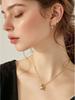 Conjunto de pendientes de perlas con diseño de nicho de moda con baño de latón en oro real transfronterizo de Europa y Estados Unidos, pendientes de viento fresco y dulce