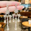 Aretes colgantes florales estilo francés, totalmente de diamantes con borlas, estilo corte vintage, largos, con forma de estrella, aretes brillantes de diamantes para uso formal y novias