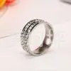 Anel de Diamantes de fileira dupla novo estilo europeu e americano para homens e mulheres anel de casal de aço inoxidável europeu e americano venda quente atacado