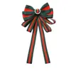 Estilo transfronterizo más vendido broche de corsage con lazo de pedrería a rayas decoración para camisa corbata cuello accesorios de flor