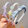 Diadema de concha de estrella de mar color macarrón con dientes antideslizante para niñas ambiente de playa accesorios para el cabello diadema infantil