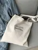 Bolsa de Lona Gran Capacidad Niños Engrosada Escuela Secundaria Preparatoria Bolso de Mano Bolso de Mano Estudiante Llevando Bolsa para Libros