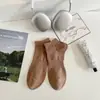 Calcetines deportivos de cintura para hombre calcetines casuales transpirables absorbentes de sudor calcetines de algodón de color liso de verano calcetines Joker para hombre al por mayor