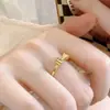 2025 Celebridad de Internet de Douyin Nuevo Anillo de Arco de Fundición No Desvanecible Soldado con Láser Anillo para Dedo del Pie de Pareja Fabricante de Origen