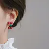Brinco de clip de alta qualidade Série Chá brincos com laço vermelho design especial de nicho Brincos de cereja sem furo