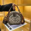 Bolso Redondo Pequeño de Moda de Gama Alta para Dama 2026 Nuevo Bolso de Mano con Estampado Retro Bolso Cruzado de Hombro Único Versátil Casual
