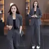 Elegante e sofisticado conjunto de terno feminino, nova coleção primavera 2026, moderno e estiloso, design que rejuvenesce, apresentando um terno e calças de perna larga, um conjunto de duas peças