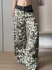 Jeans rotos de patchwork bicolor con estampado de leopardo para hombre y mujer, pantalones estilo vintage hiphop wasteland, pantalones anchos de alta calle americanos