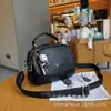 Bolsa de hombro cruzada de verano nuevo modelo de piel de oveja negra original hecha a mano estilo universitario retro simple casual mochila