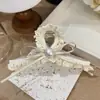 Pinza para el pelo de encaje con lazo de cinta de perla texturizada estilo coreano, pinza para la cabeza dulce, tocado súper de hada, accesorios para el cabello para mujer