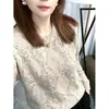 Nueva colección otoño 2026: Suéter de punto para mujer con cuello redondo, con un diseño calado, un estilo chic y versátil, un corte holgado y un efecto adelgazante, perfecto para primavera y otoño.